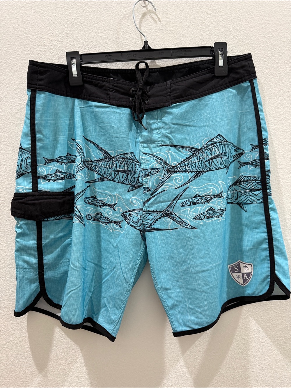 Salt Armor Men's Light Blue Fish-Print Swim Trunks with Black Trim